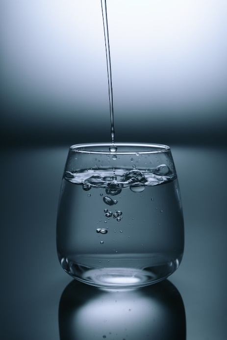 A glass of water. 