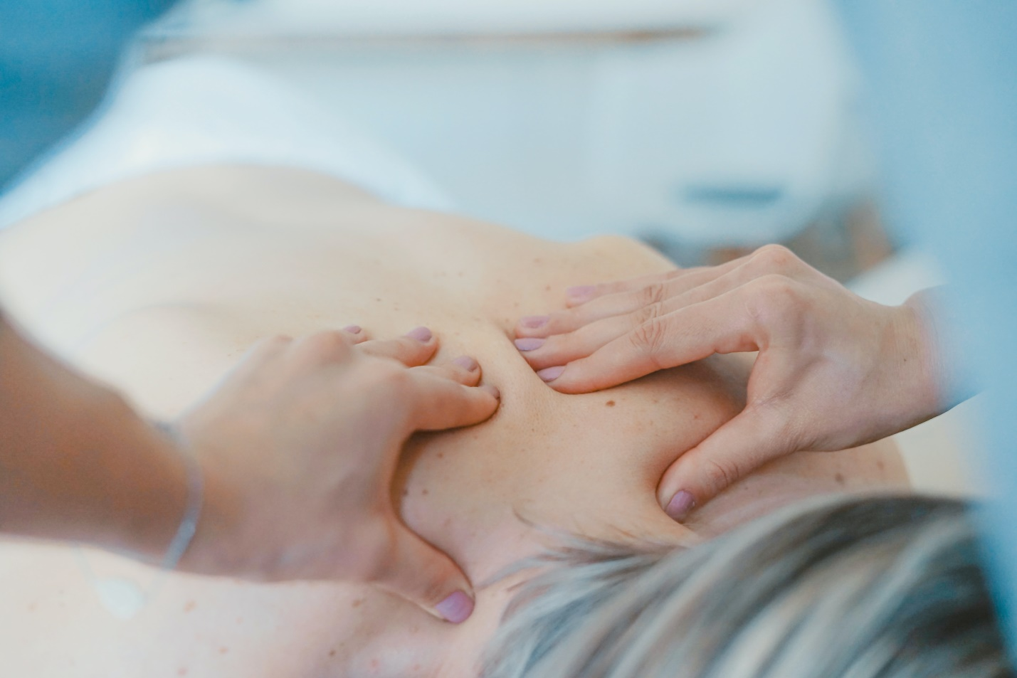  A person using a spinal adjustment technique