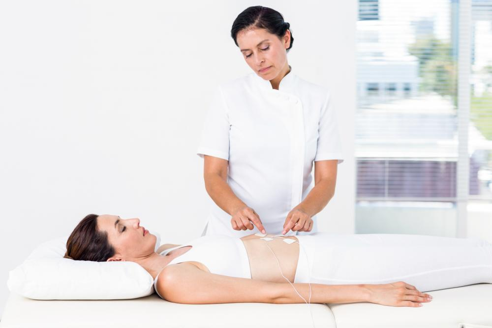 A person undergoing electrical stimulation therapy.