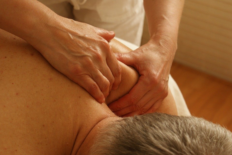 A patient with shoulder pain undergoing treatment