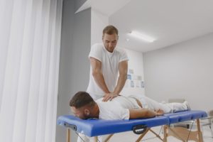 A patient undergoing trigger point chiropractic treatment
