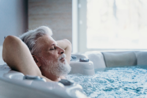 Man having hydro-massage to relax his muscles