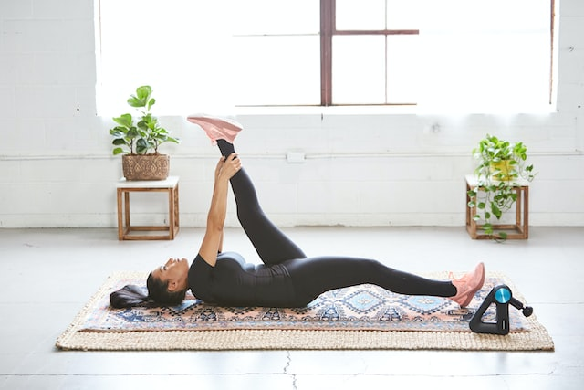 A woman exercising to increase flexibility and mobility 