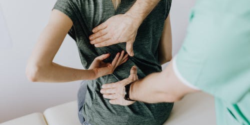 In the Zone: Unveiling the Healing Magic of Therapeutic Tape in Chiropractic Care