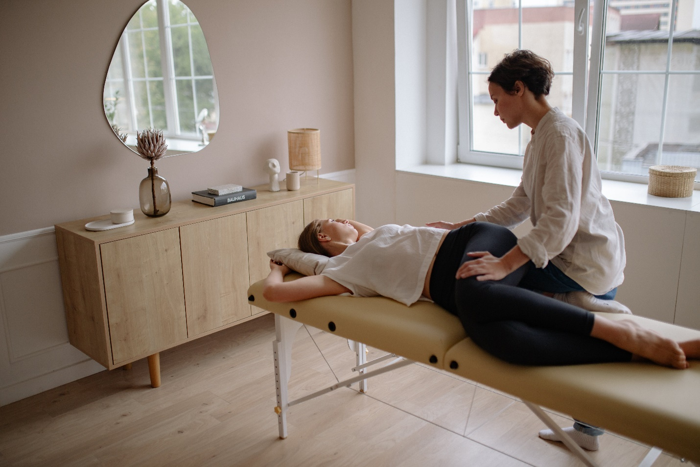  a patient getting chiropractic solutions for desk-bound people from a chiropractor